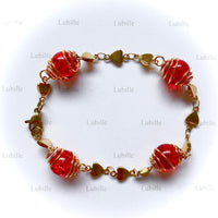 Bracelet or "rouge écarlate"