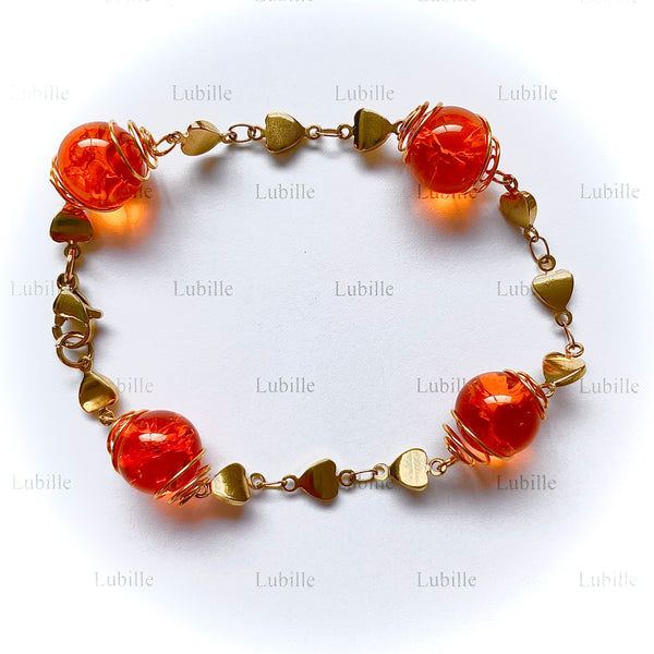 Bracelet or "orange vitaminé"