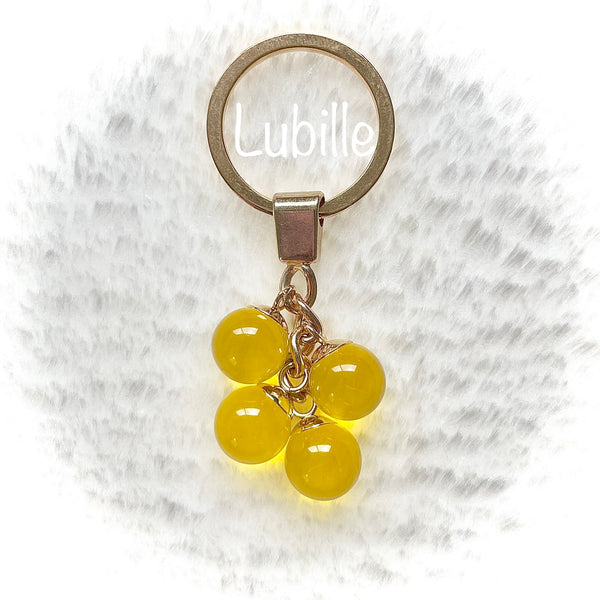 Porte-clefs or "soleil jaune"